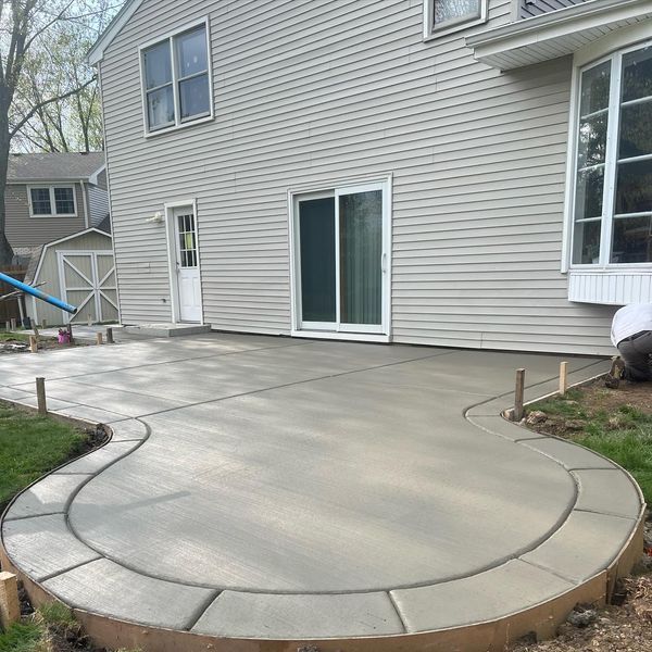 added onto existing concrete patio in back of house